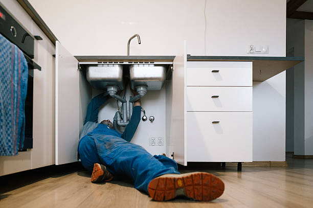 Professional Plumbing technician working in Whitsett, NC